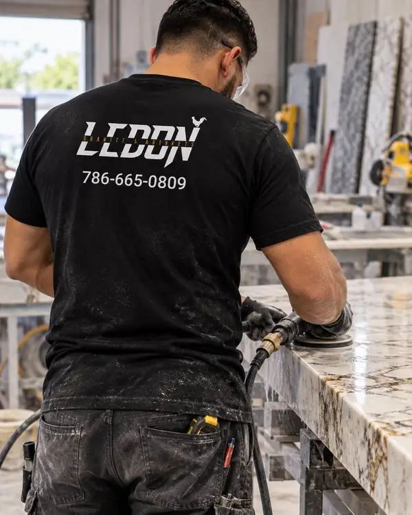LEDON installer polishing a granite countertop